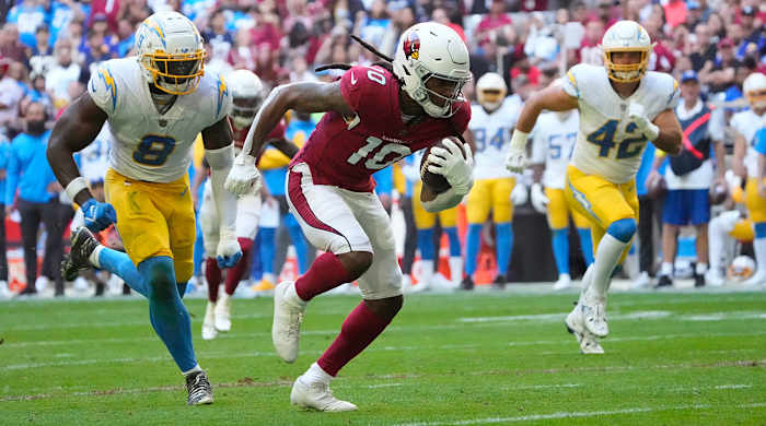 DeAndre Hopkins runs with the ball for the Cardinals.